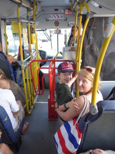 On the local bus. See the turnstile in the aisle?